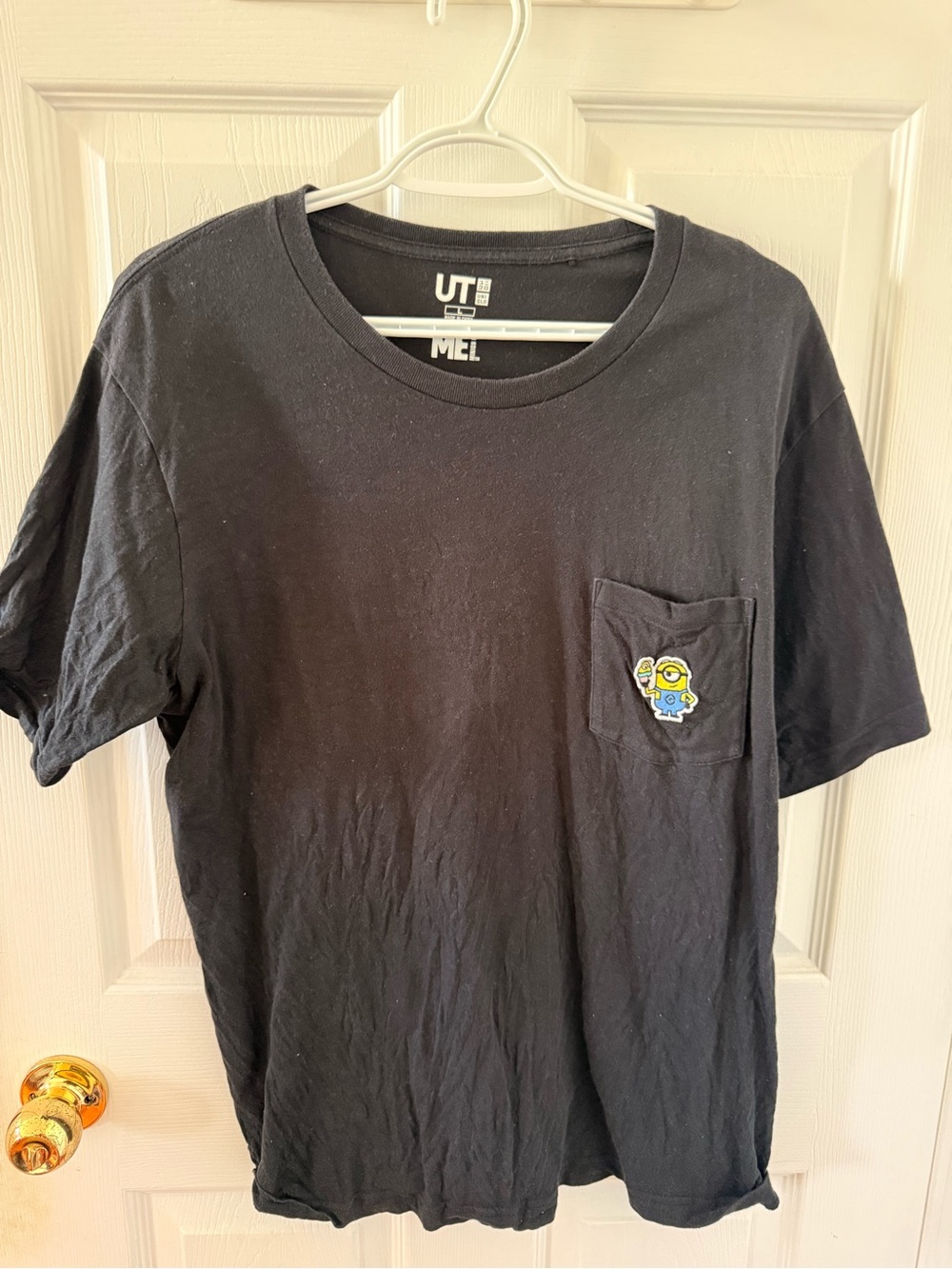 Uniqlo Black Pocket Tee with Minion Patch